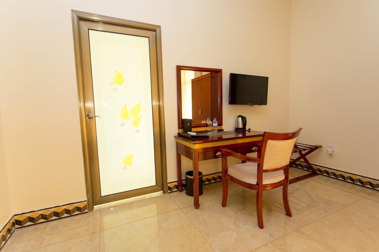 Dove Hotel Kigali Bagian luar foto